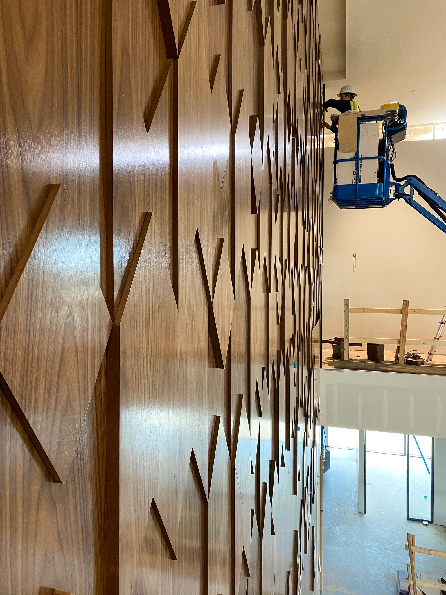 Clark Contractors install interior feature wall at the new Relyance Bank Headquarters.