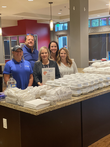  A team of our associates, Paula Styers, Paula Moran, DeAnna Korte, David Straessle and Kate Barlow, put their skills to work by plating and serving up the delicious meals donated by Relyance Bank.